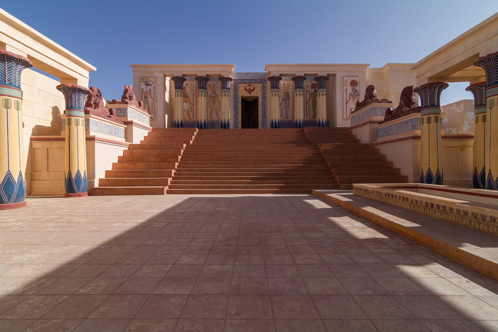 Egyptian columns and broad stone steps at the Cleopatra Palace film set in Atlas Studios, Ouarzazate