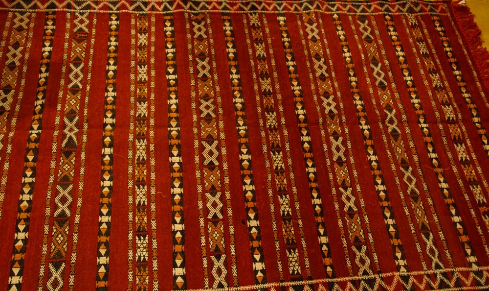 Close view of a patterned Moroccan woven carpet