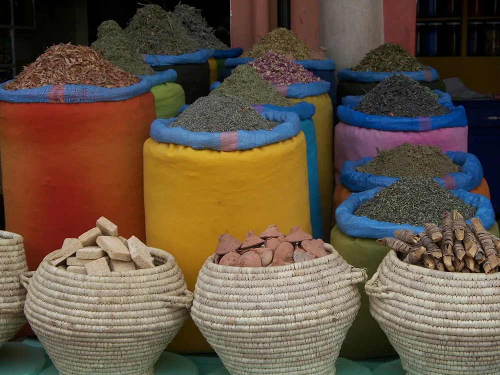 Spices and dried botanicals in baskets and sacks in Marrakech